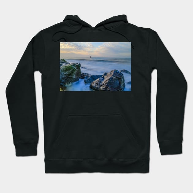 Rocks protecting the fragile cliffs from coastal erosion Hoodie by yackers1